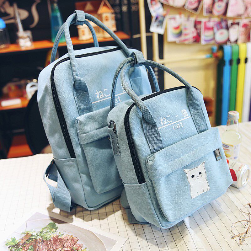 Primary school students tuition bag large hand carry couple new backpack cartoon female bag canvas backpack book bag back