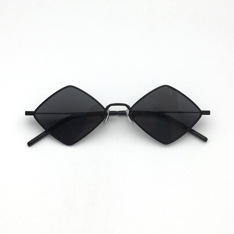 This Model Features a Rare Diamond-Shaped Lens Design, a Thin Metal Frame, and Is Very Light and Clean on the Face