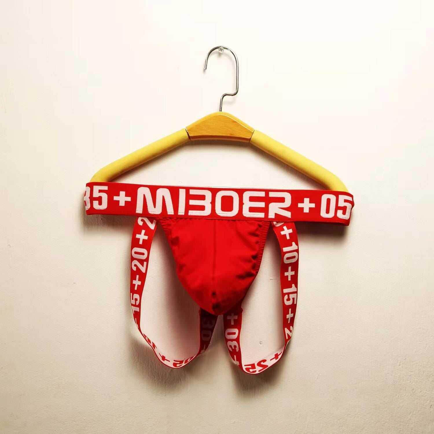 New men's hollowed-out low waist U convex sack elastic pants men's fashion flower style 384