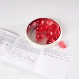 Фенгти персиковая эссенция сущности грудной капсулы Эссенция масла 15 капсул затягивают и осветляют сингапурский блейфонти