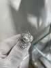 A two-wear ring that can be worn daily or for flamboyance. 10.64mm Australian white set with 18k natural diamonds. Dazzling.