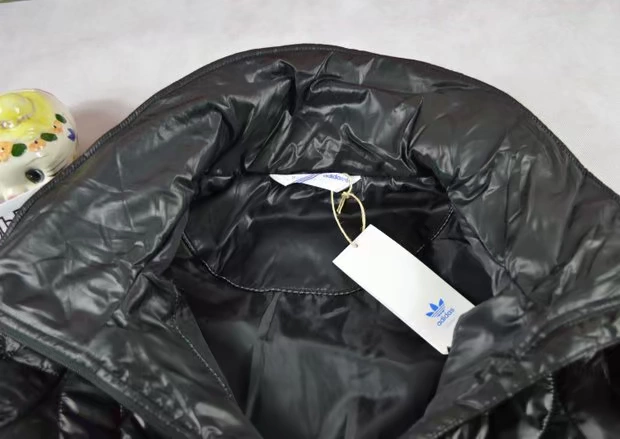 Muzi Sports  / clover áo khoác nữ áo khoác cotton màu đen đỏ P00721 ​​P00722 - Quần áo độn bông thể thao