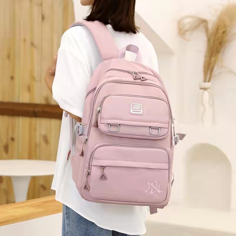 Japanese waterproof schoolbag female junior high school students thickening and reducing the burden light high school students large-capacity middle school students simple backpack