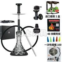 Прозрачная бутылка с черным рисунком и расходным углем из скорлупы кокосового ореха.