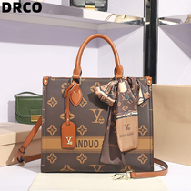 French DRCO large-capacity bag female new tide big-brand senior cow Pitot bag handheld slope-shoulder bag