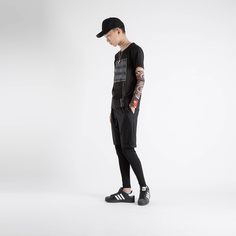 Tide thương hiệu bó sát giả quần hai mảnh đáy quần nam với chân dầm dừa tập thể dục quần bó sát chân phong cách quần âu - Quần Jogger quần đùi nam