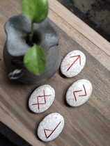 Spot (the mark of the magic mirror) pine stone print rune luhn stone such as the Niishi Nordic alphabet