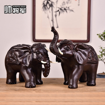 Ebony carved elephant ornaments A pair of wooden home living room entrance decorations Handmade solid wood carving crafts