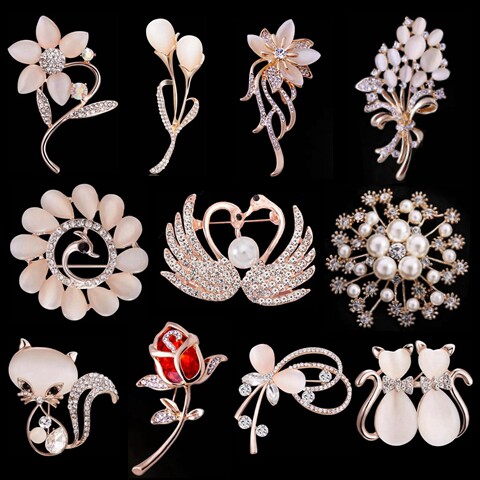 Brooch female Japan-ROK new 100 hitch-pin high-end luxury water drill chest flower fixing clothes anti-walking light cat eye buttoning pin