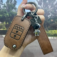 Коричневый чехол, металлический ремешок, серебряный космонавт