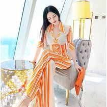 Early summer temperament V collar striped color set 2021 new mid-sleeve shirt top micro Bell pants two-piece tide