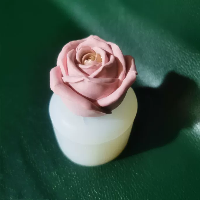 Three dimensional mold contains rose, acrylic ice cubes, handmade soap, aromatherapy, candle, 3D