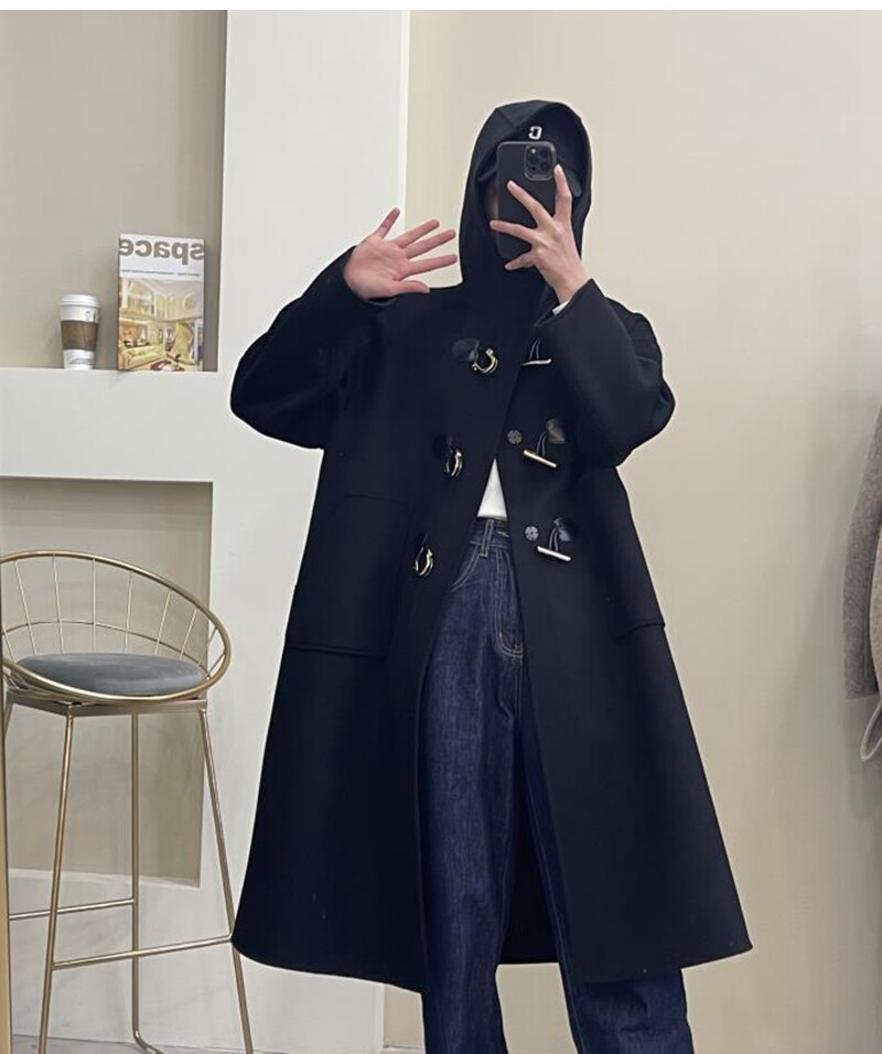 The new Han Cashmere Double - sided Cashmere Coat Woman in 2021 is a new Korean edition of loose hair coat woman