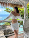 DOLCEVITA beach vacation lace-up long-sleeved hollow white sexy hip-hugging short skirt knitted blouse suit for women