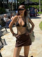 DOLCEVITA beach sexy hottie coffee-colored European and American skirt summer low-waist slim hip-covering short skirt safety pants