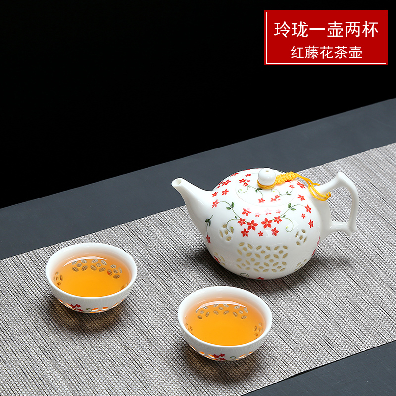 Fujian blue and white and exquisite kung fu tea set ceramic honeycomb hollow out macro tea sea teapot teacup of a complete set of accessories