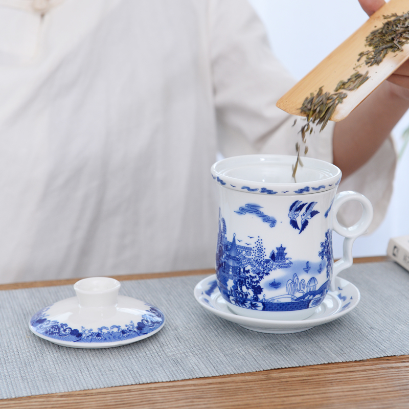 Ceramic tea set four cups of blue and white porcelain filtering cup of individual water cup with cover to filter the office tea cup