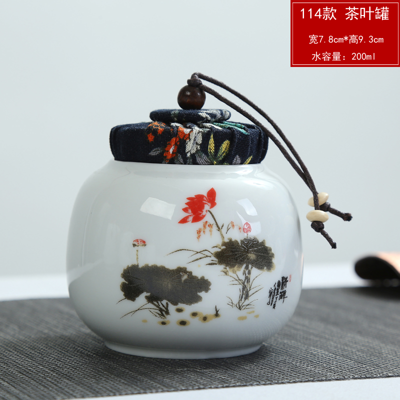 Small mini ceramic high - grade tea caddy fixings seal box of guanyin tea cylinder portable kung fu tea pot POTS