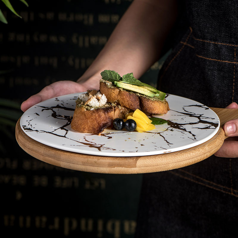 The Nordic dish steak dinner plate with black ceramic round SaPan wooden pallet with The handle