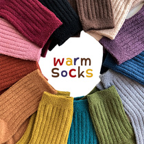Autumn and winter childrens socks thickened and velvet boys and girls small childrens socks in the tube baby candy color pure half wool cotton