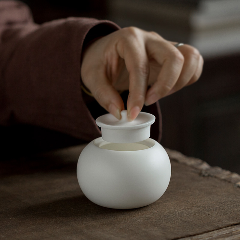 Don difference up dehua white porcelain tea pot ceramic seal creative small POTS mini storage jar tea accessories