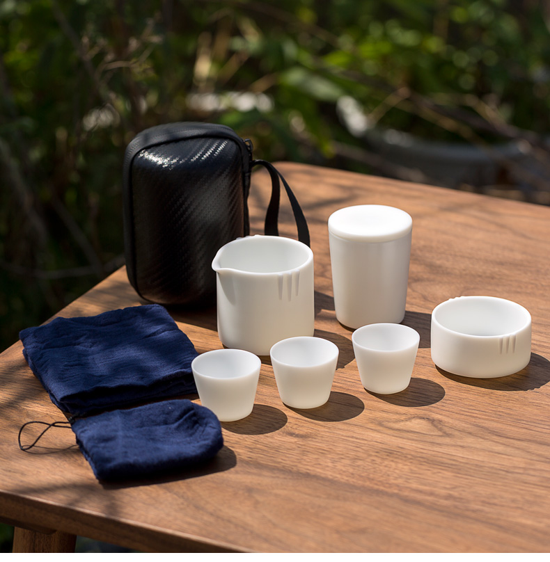 Tang dehua white porcelain cup to crack a pot of the third cup second cup travel portable kung fu tea set car is suing tea cups