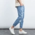 GleMall Tide thương hiệu quần jean nam mùa xuân và mùa hè Quần nam mới thiết kế lỗ mùa hè quần jeans chín điểm - Quần jean