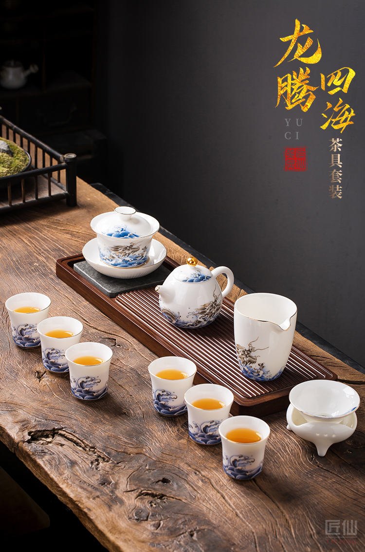 Artisan fairy kung fu tea set ceramic office contracted household lid bowl of a complete set of high - end gift boxes