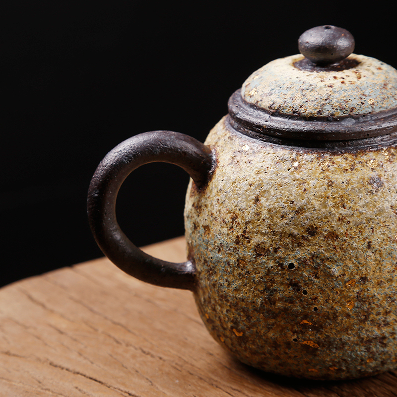 Ancient undressed ore Taiwan sheng up manually lava coarse pottery tea teapot to burn natural fire rock ore ball hole, single pot