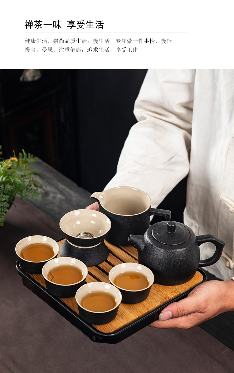 Black pottery travel kung fu tea set to crack a pot of four cups of portable BaoHu outside Japanese household custom logo