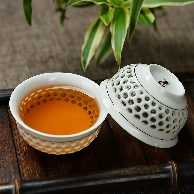 To the as porcelain and white porcelain kung fu tea set suit household contracted hollow honeycomb porcelain cups and exquisite tureen clearance