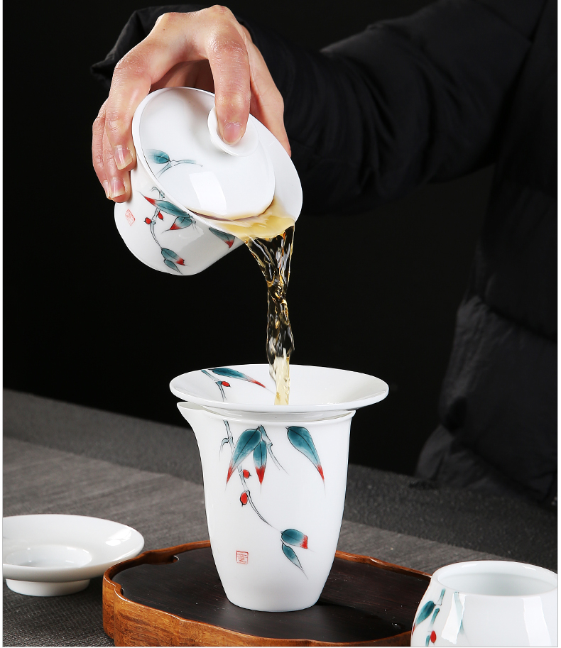 Dehua white porcelain kung fu tea set suit household hand - made tureen tea teapot tea cups of a complete set of suits for