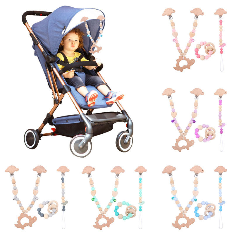 Baby products silicone molar bracelet children's toys dinosaur cart chain three-piece creative small bell pendant