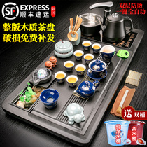 Kung Fu tea ceremony tea tray solid wood Tea Sea Go kiln ceramic purple sand home living room set of tea set four in one