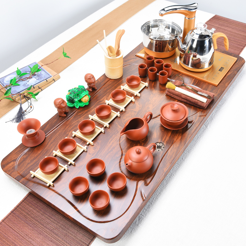 Solid wood tea set the joining together of four domestic tea sets of purple sand cup tea tea tray was contracted Europe type automatic sheung shui