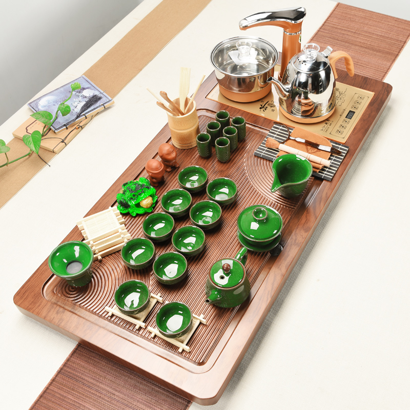 Violet arenaceous kung fu tea set solid wood tea tray of a complete set of household contracted suit electromagnetic heat furnace automatic four unity