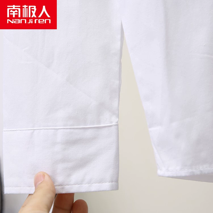 Áo thu đông Nam Cực dài tay mới ruy băng đáy dài phiên bản Hàn Quốc áo sơ mi nữ cotton rộng màu trắng hoang dã