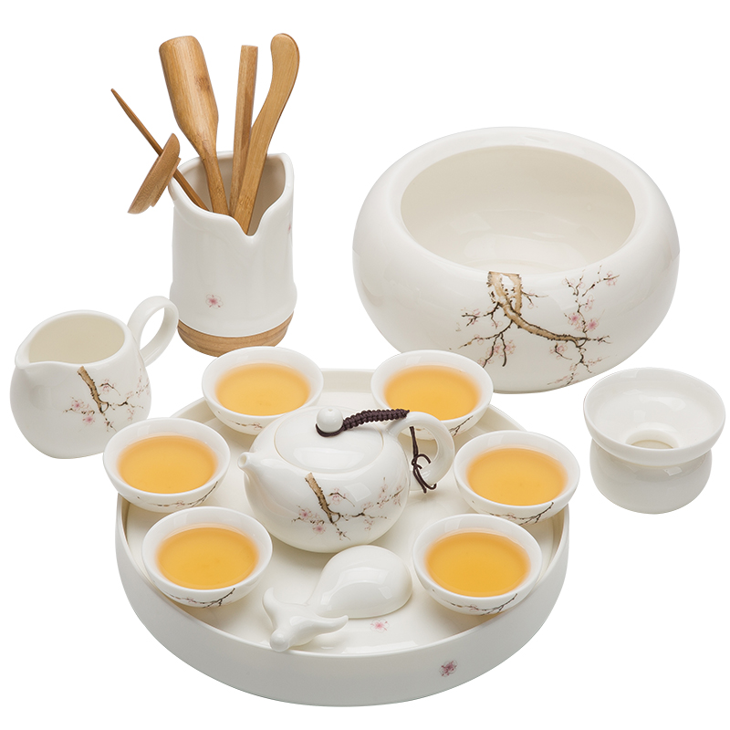 A complete set of dehua white porcelain suet jade suit household green kung fu tea set ceramic tea tray was contracted tea table