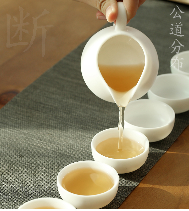 Dehua suet jade biscuit firing manual white porcelain kung fu tea set suit household ceramic teapot of a complete set of tea cups