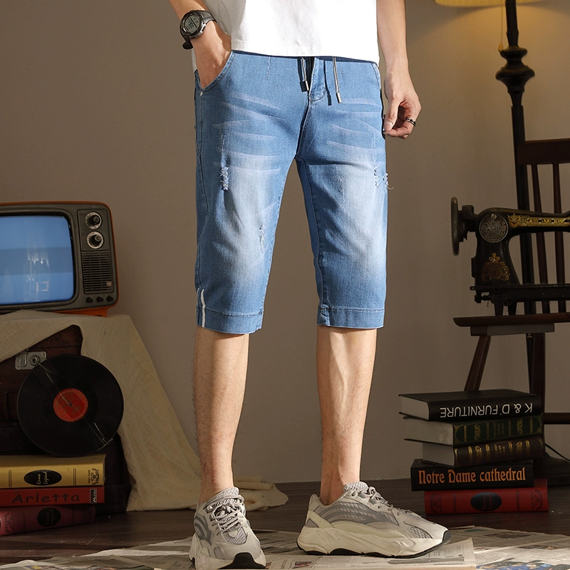 Quần jeans bảy điểm mùa hè nam phiên bản Hàn Quốc của Slim youth quần short bảy điểm xu hướng quần short nam và quần dài - Quần jean