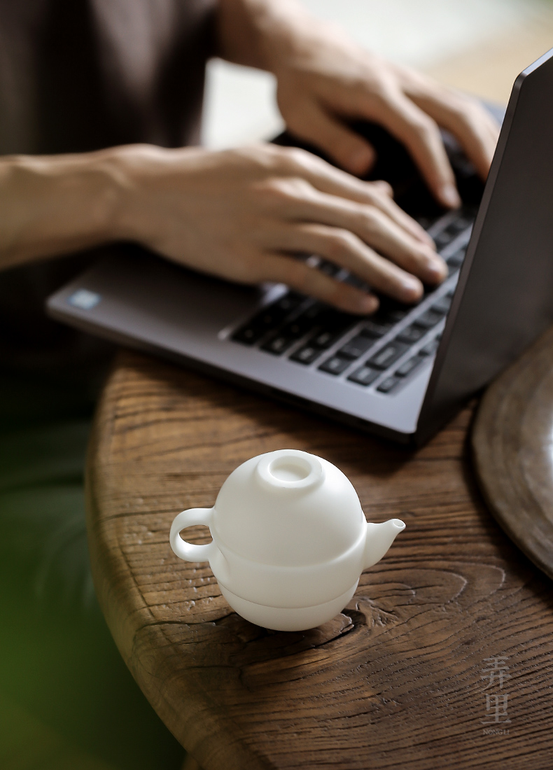 Travel tea set ceramic cups kung fu dehua white porcelain cup to crack a pot of two cups of Japanese portable teapot