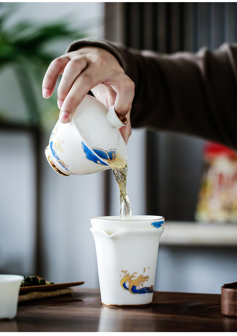 Make waves in the white porcelain tea set household contracted kung fu tea pot of a complete set of ceramic tea tureen jade porcelain cups