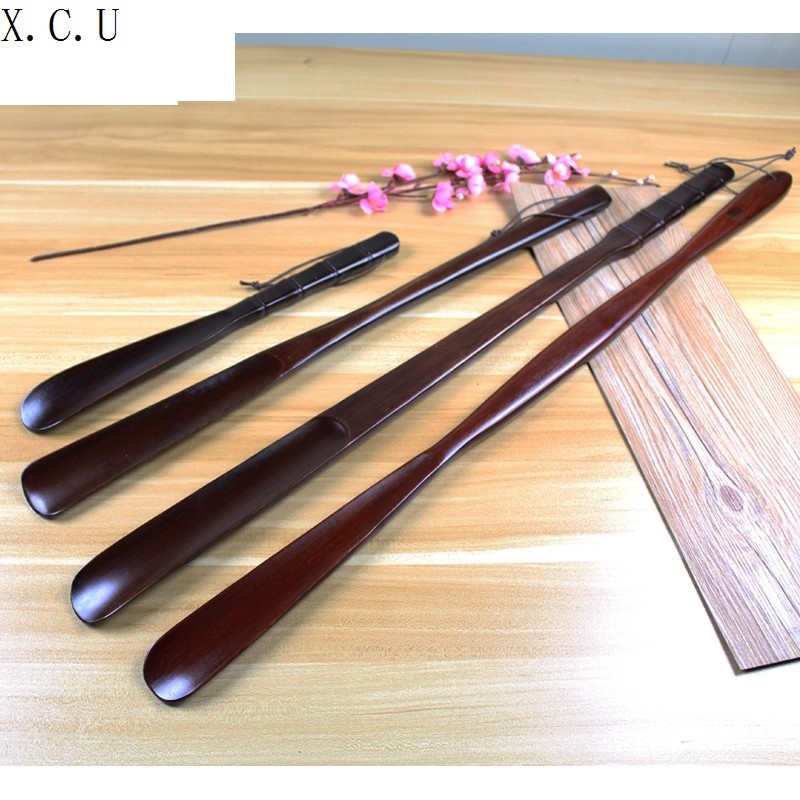 Shoehorn solid wood shoehorn lengthened 70cm wooden shoehorn does not bend over Shoes shoes pull long handle shoes pull shoes