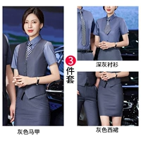 Женский серый жилет + темно-серая рубашка с короткими рукавами + юбка в стиле вестерн.