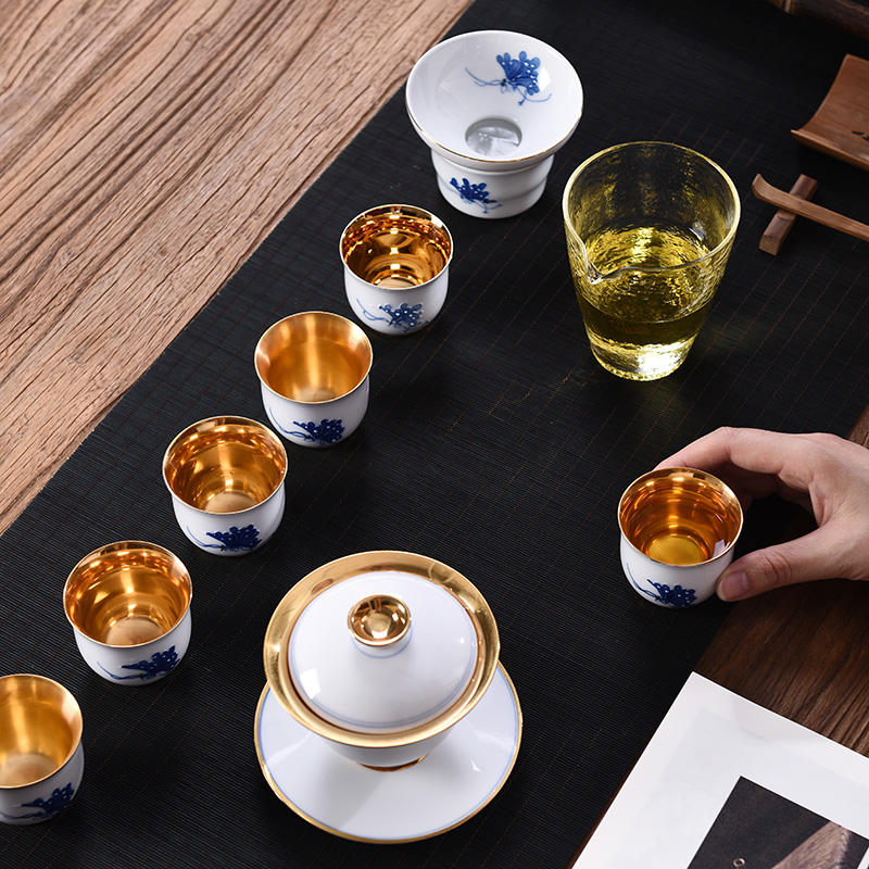 Creative hand - made ceramic gold kung fu tea set home office tureen tea cups of a complete set of gift boxes