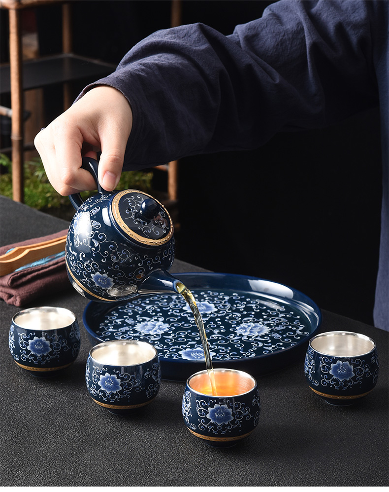 Jingdezhen household kung fu tea tea set tea service office to receive a visitor a small set of pot of four cups coppering. As silver tea set