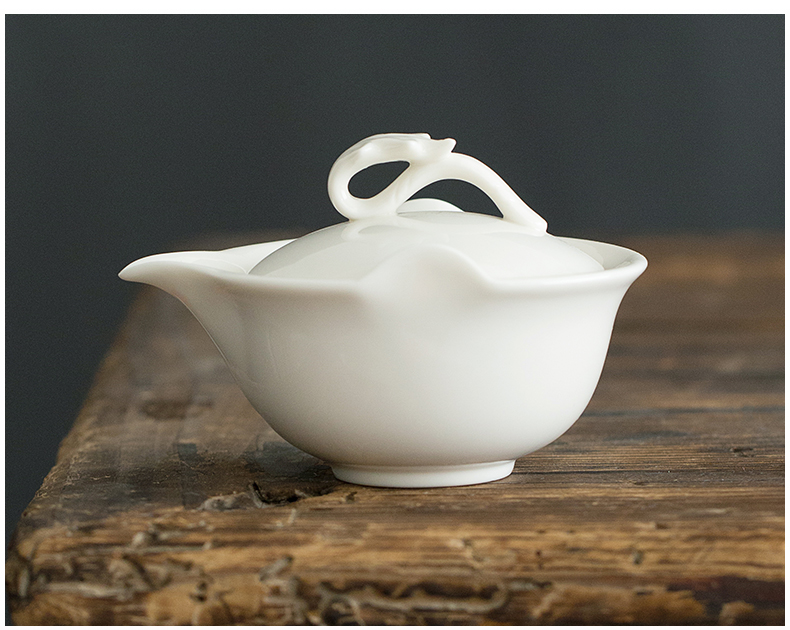 Dehua lard white porcelain hand grasp pot of ceramic kung fu tea tureen filter to use cups with three bowls of household