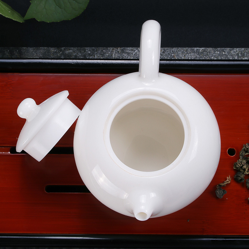 Earth story white porcelain ceramic teapot single pot of household teapot hand xi shi pot of dehua white suet in China