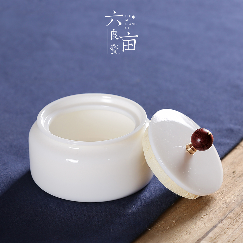 Dehua white porcelain Chinese white seal pot of tea box of ceramic tea pot high - grade porcelain tea tea home with cover