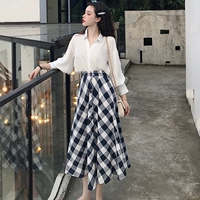 Mùa xuân và mùa thu mới retro cổ chữ V Đèn lồng dài tay nữ + kẻ sọc cao eo dài váy đầm rộng đầm đi biển